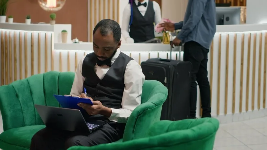 Hospitality Entrepreneurs Checking Tax Data
